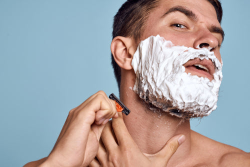 man shaving man shaving